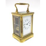 A Mid XX Century French Repeater Brass Cased Carriage Clock, the white enamel dial with Roman