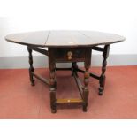 A Late XVII / Early XVIII Century Joined Oak Gateleg Table, with oval top and single drawer on