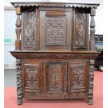 A XIX Century and Later Carved Oak Court Cupboard, the top with scalloped frieze, carved panels,