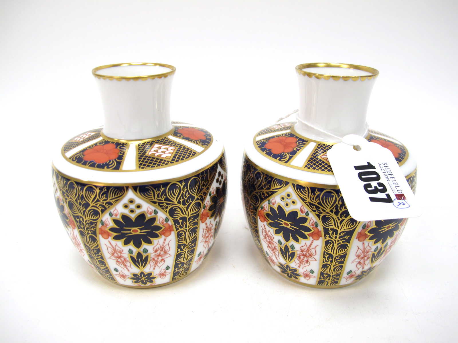 A Pair of Royal Crown Derby Imari Pattern 1128 Porcelain Vases, of high shouldered form, red printed