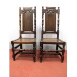 A Pair of XVII Century and Later Joined Oak Chairs, with flat top rails, turned finials, arched