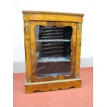 A Mid XIX Century Walnut Marquetry Inlaid Pier Cabinet, with ormolu mounts and glazed door on a