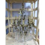 A Mid XX Century Brass Two Tier Hanging Chandelier, the upper section with five sconces, the lower