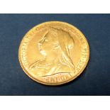 Queen Victoria Old Head Gold Sovereign, 1899, accompanied by Westminster C.O.A., (8.0g).