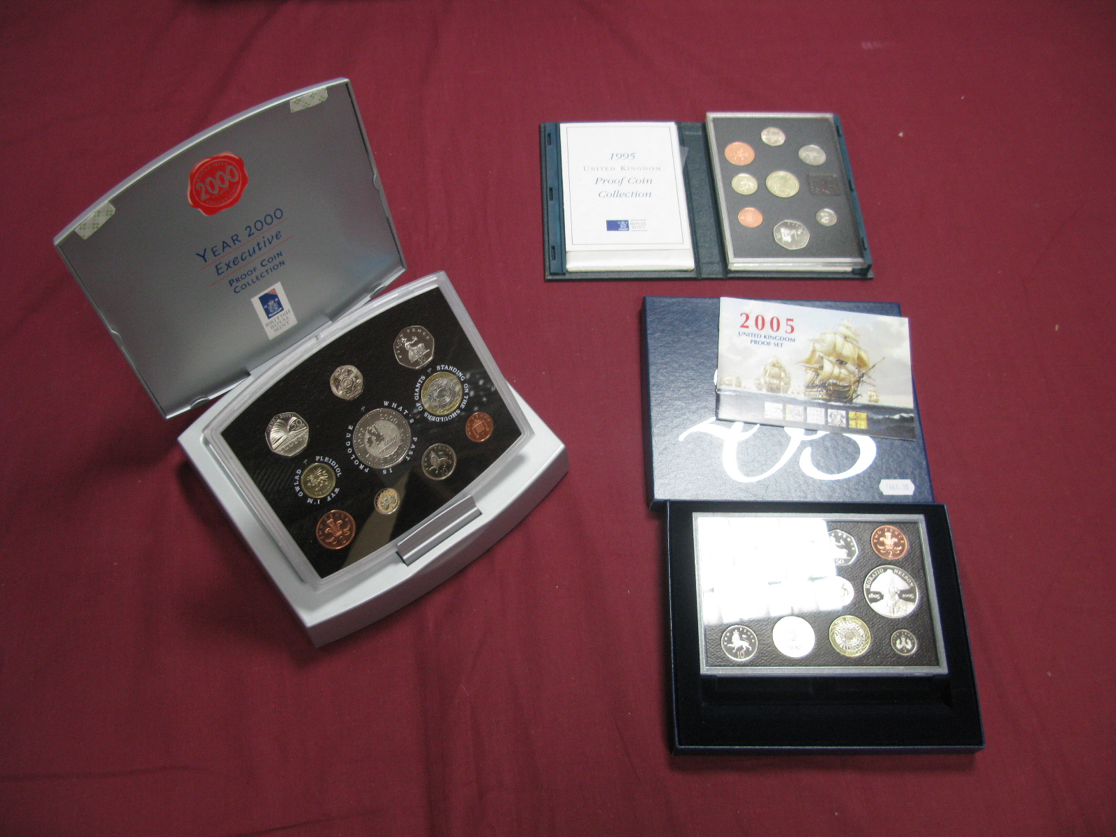 Three Royal Mint United Kingdom Coin Sets, comprising of Year 2000 Executive Proof Coin