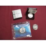 Three Silver Coins, comprising of Royal Mint Silver Britannia 2002, £2, Canada Silver Maple Leaf