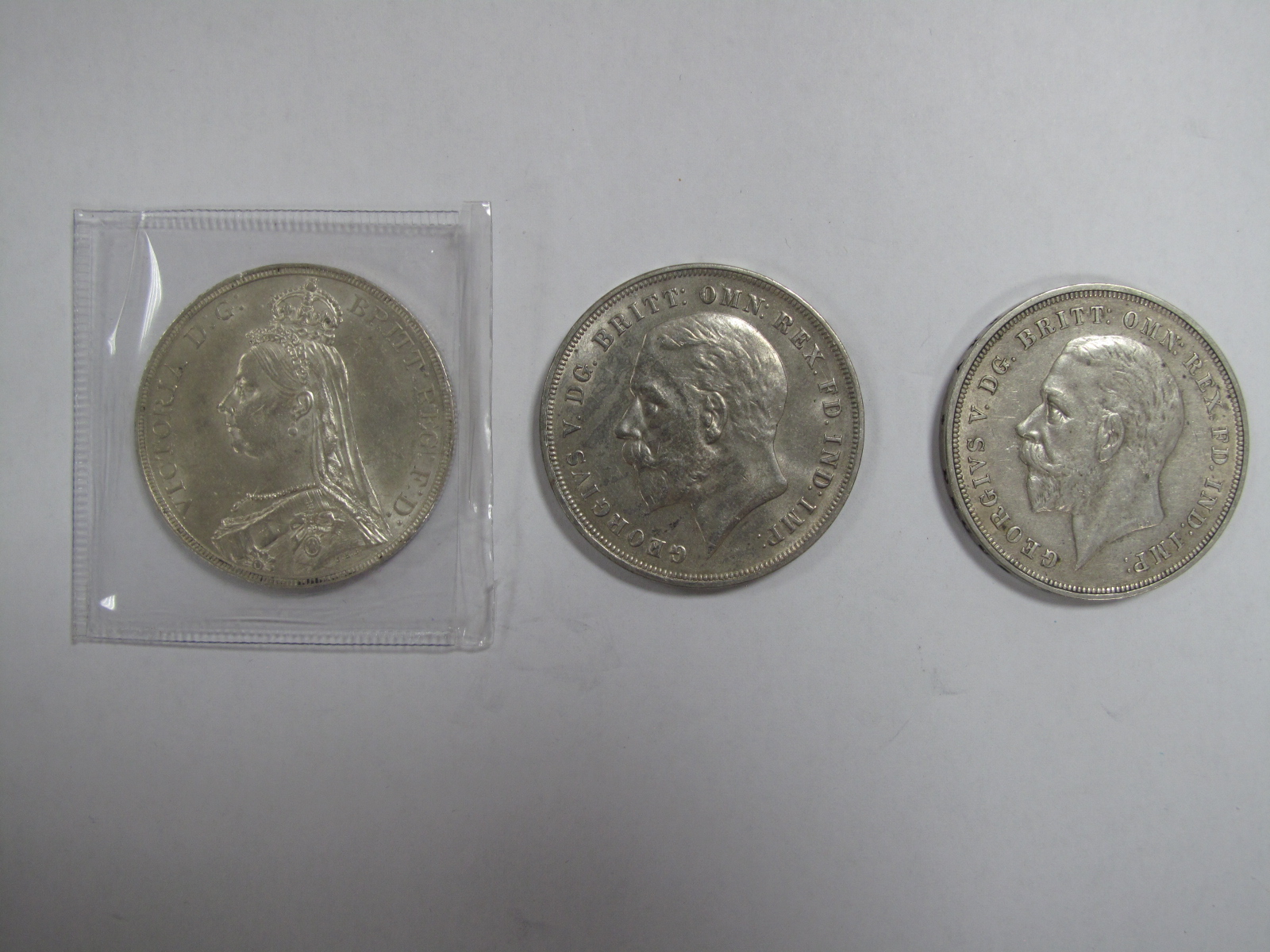 Three United Kingdom Silver Crowns, comprising of Queen Victoria 1890 'Jubilee Head', nice grade,