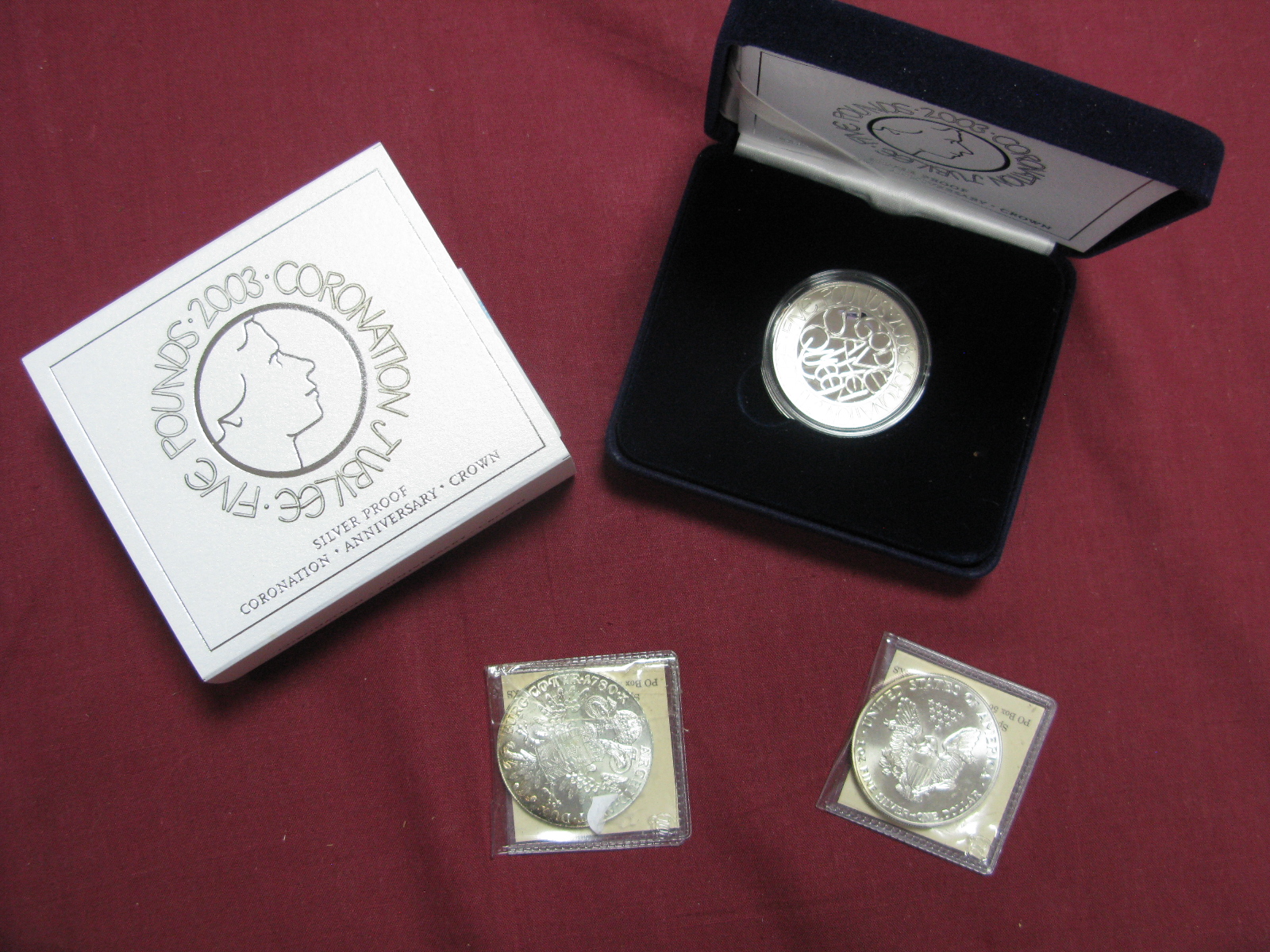 Three Silver Coins, comprising of Royal Mint 2003 Coronation Jubilee Silver Proof Five Pounds,