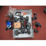 A Quantity of Remote Control Car Spares, including two chassis/motors/suspension components,