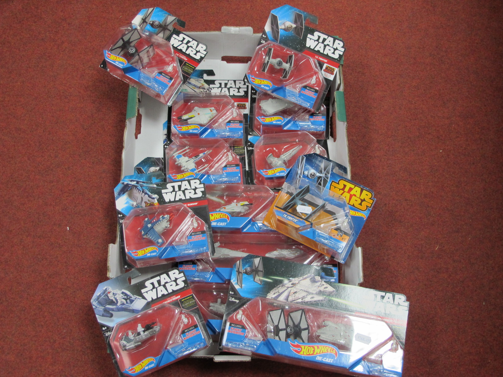 Approximately Thirteen Modern Star Wars Plastic Model Space Vehicles, by Hot Wheels, including Tie