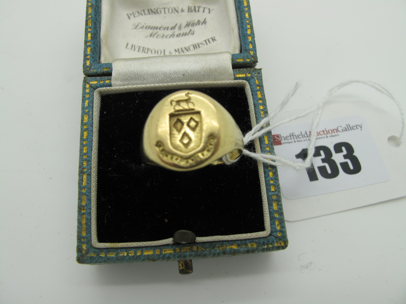 A Gent's Signet Ring, with "Festina Lente"? seal engraved oval panel, (finger size P½), (8 grams).