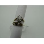 A Modern 9ct Gold Cluster Ring, claw set throughout, between tapered shoulders, (finger size O½);