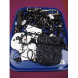 A Ladies Modern Bead Drawstring Purse, together with a selection of modern costume bead necklaces,