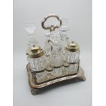 A Decorative XIX Century Plated Condiment Stand, fitted with a set of four graduated stoppered