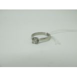 A Platinum Single Stone Diamond Ring, the (4.5mm) brilliant cut stone four claw set between plain