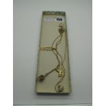 A 9ct Gold Crown Pendant, if openwork textured design, 90 "9k" fine chain, another chain, stamped "