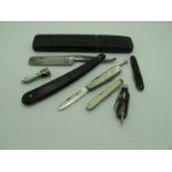 A George Butler Cutthroat Razor, a multi blade pocket knife with hallmarked silver fruit blade, a