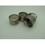 A Set of Three Hallmarked Silver Napkin Rings, LR & S, Sheffield 1946 with engine turned band
