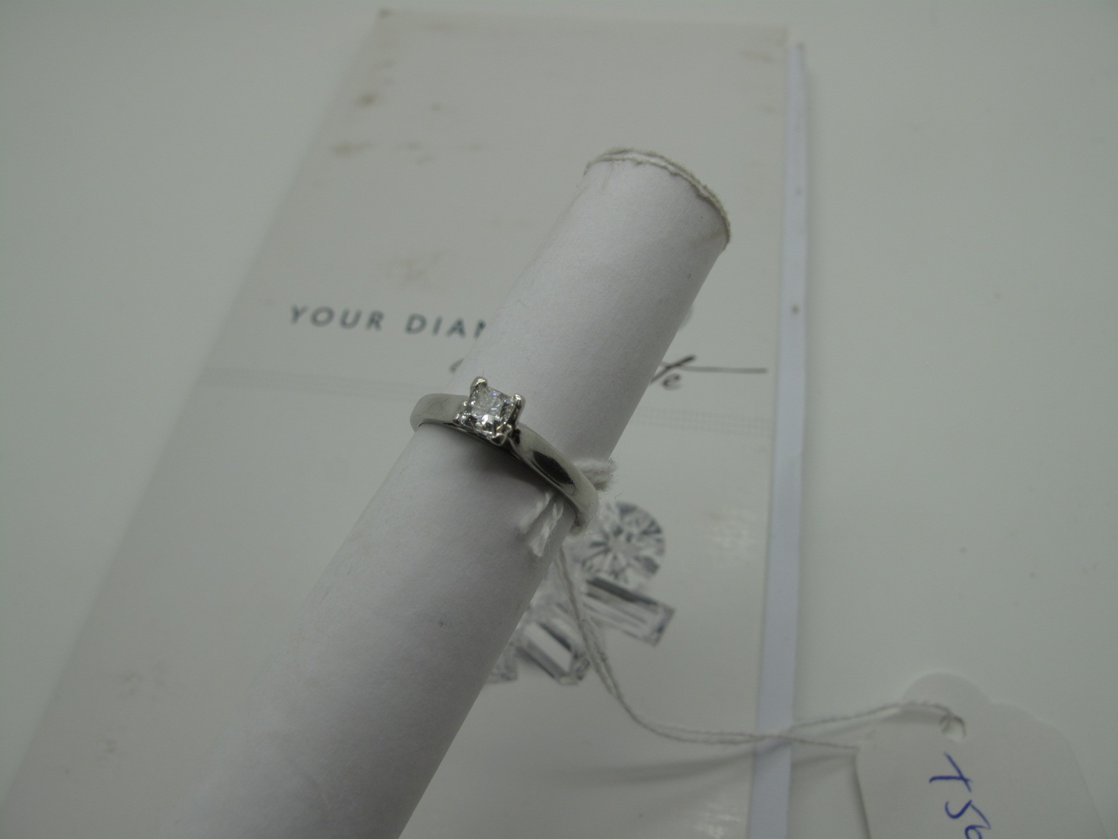 A Modern Platinum Princess Cut Single Stone Diamond Ring, four claw set (finger size N 1/2). *