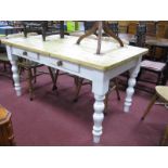 A Pine Kitchen Table, with two drawers on turned white painted legs, 160cm wide.