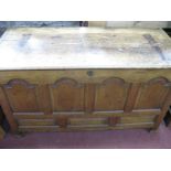 An XVIII Century Joined Oak Large Blanket Box, with four arch panel fascia (later hinges), 141cm