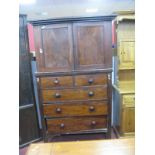 A XIX Century Mahogany Linen Press, the top with twin panelled doors, two internal shelves, base