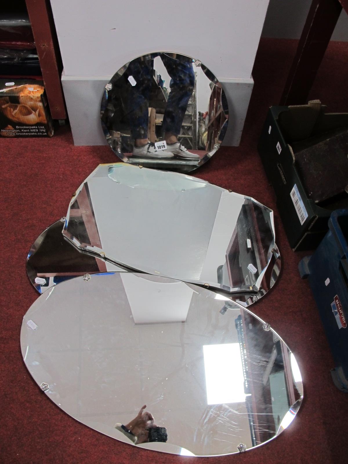 A Pair of Oval Shape Mirrors, with scalloped edges, with two other mirrors. (4)