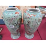 A Pair of Oriental Pottery Vases, one decorated with Samurai warrior, the other with Geisha Girl,