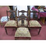 A Set of Four Edwardian Walnut Parlour Chairs, with poker work carving to top rail and splat back.