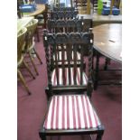 A Set of Four 1920's Oak Dining Chairs, each with carved top rail, wavy rail backs, barley twist