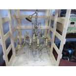A Mid XX Century Brass Two Tier Hanging Chandelier, the upper section with five sconces, the lower