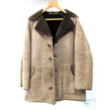 A Gents Three Quarter Length Sheepskin Coat.