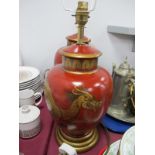 A Pair of Oriental Red Vases, converted into lamps with Dragon motifs.