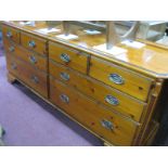 An Elongated Pine Chest of Eight Various Sized Drawers,with low back, and canted corners 171 cm