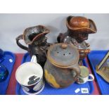 Two XIX Century Treacle Glazed Toby Jugs, lidded jar, frog mug featuring garden sconces, cream jug