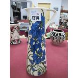 A Moorcroft Pottery Jug, painted in the 'Delphinium' pattern by Kerry Goodwin, painted and impressed