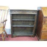 An Early XX Century Oak Bookcase, with carved sides and top, 90cm wide.