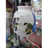 A Moorcroft Pottery Vase, painted in the 'Snowball Battle' pattern designed by Kerry Goodwin,