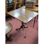 A XIX Century Mahogany Tilt Top Table, rectangular, with snap action, on turned pedestal and