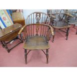 A XIX Century Ash Elm Windsor Chair, with a hooped back, pierced splat rail supports, on turned