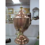 A Victorian Copper and Brass Table Urn, with inscription dated 1903, 45cm high.