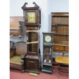 A Black Painted Miniature Longcase Clock, with a white dial, glazed door, with books and