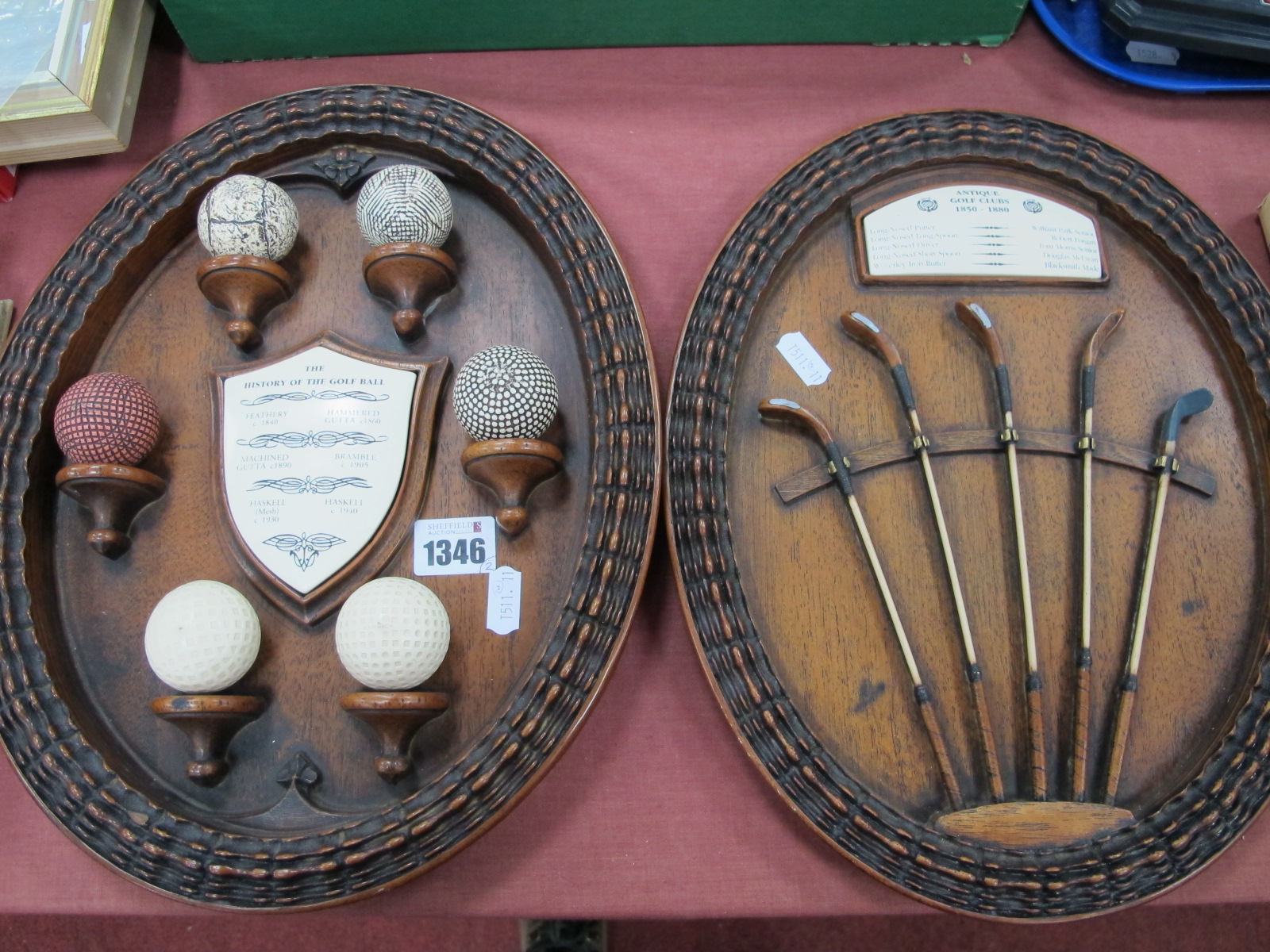 A Pair of Oval Shaped Contemporary Golf Display Plaques, showing vintage golf clubs and balls, 33.