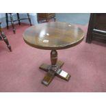An Oak Coffee Table, with circular top, turned pedestal on quatrefoil base, 46cm x 47cm.