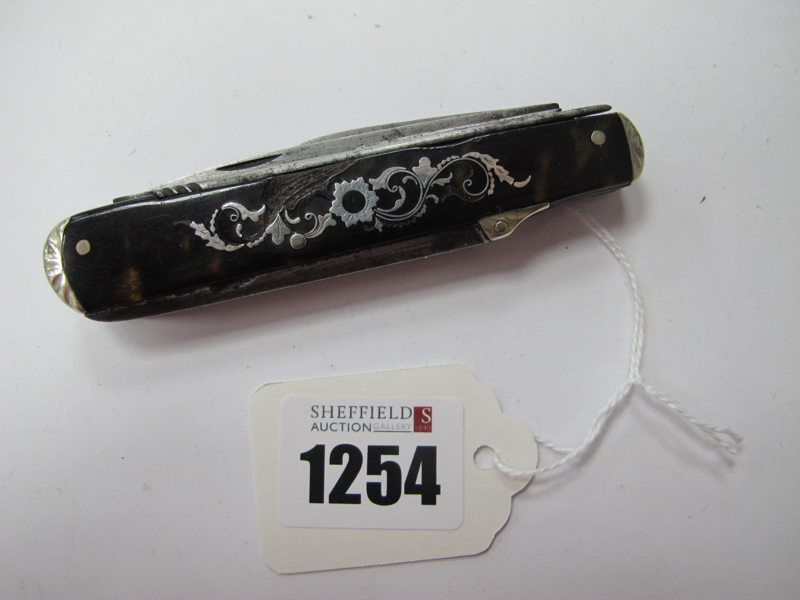 A Multi Blade Knife by Waser, seven in total, corkscrew, spike hook etc, all housed in a