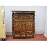 A Late XVII Century Joined Oak Court Cupboard, the top with a stepped cornice two panelled