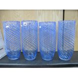 Four Blue Twist Design Glass Cylinder Vases, 35cm high.