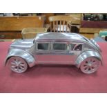 An Art Deco Style Contemporary Aluminium Model of a Vintage Car, 33.5cm wide.