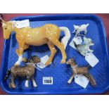 A Beswick Palomino Horse, two Beswick foals, Geebell pussycat and pottery lamb. (5)