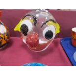 John Ditchfield for Glasform; A Clear Glass Clown's Head, with applied features and bright yellow